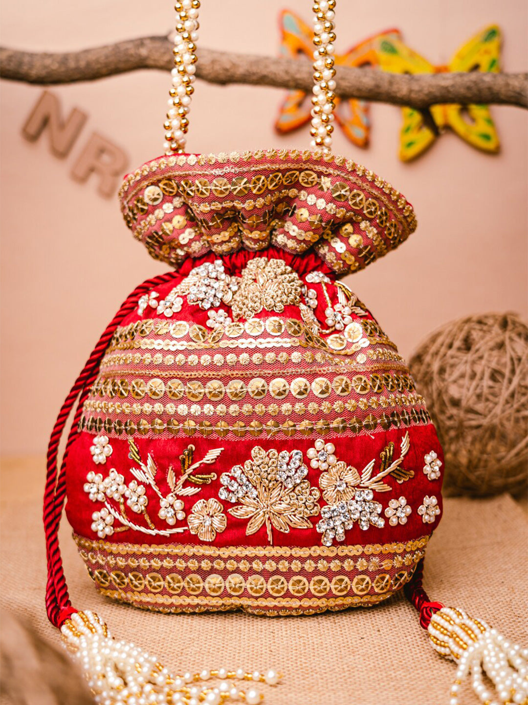 NR By Nidhi Rathi Maroon & Gold-Toned Persia Embroidered Potli Clutch - Distacart