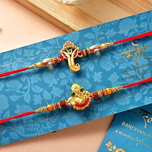 2 Ganesha Gajmukh Rakhi & Assorted Cashew Online