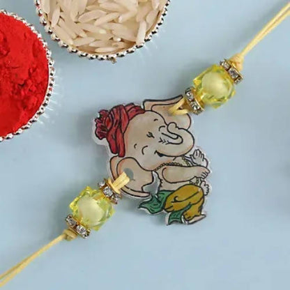 Bal Ganesha Rakhi & Almonds Jar Online