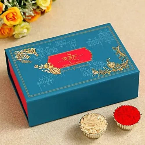 Om Golden Bracelet Rakhi & Kaju Rolls Box Online