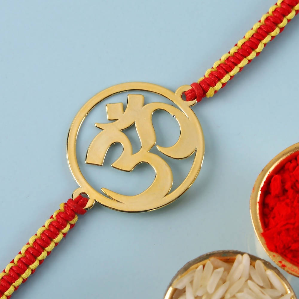 Ethnic Om Metal Rakhi & Dairy Milk Chocolates - Distacart