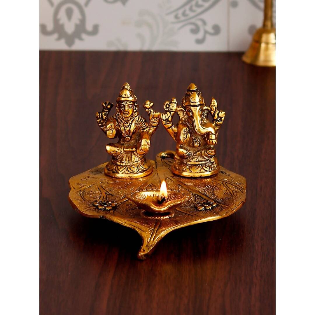 eCraftIndia Antique Gold-Toned Metal Handcrafted Laxmi Ganesh With Diya On Leaf - Distacart