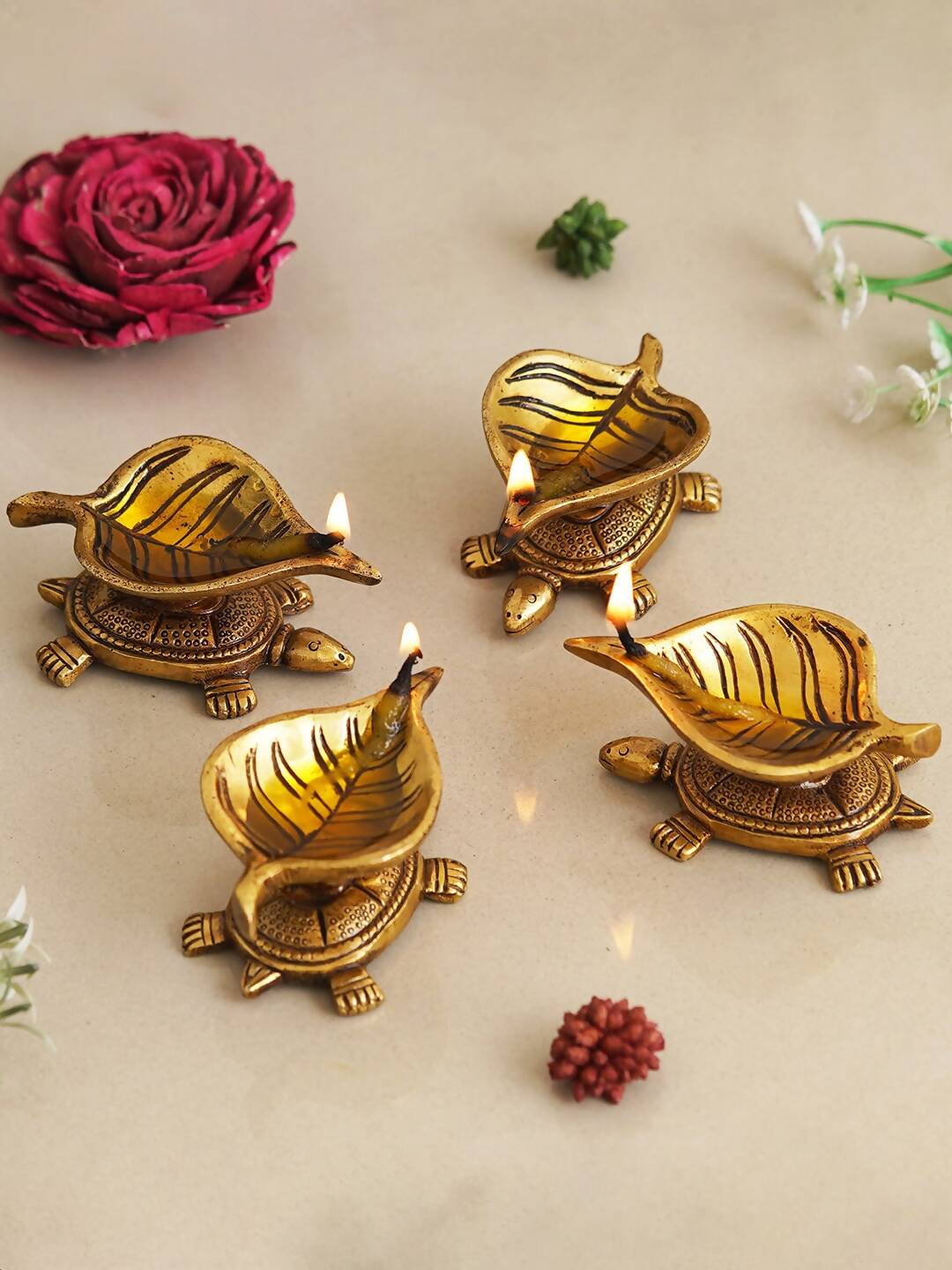 eCraftIndia 4 Pieces Beige Tortoise Statue Leaf Design Diyas - Distacart