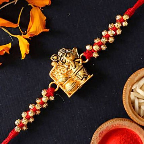 Cute Ganesha Rakhi and Cashew Jar