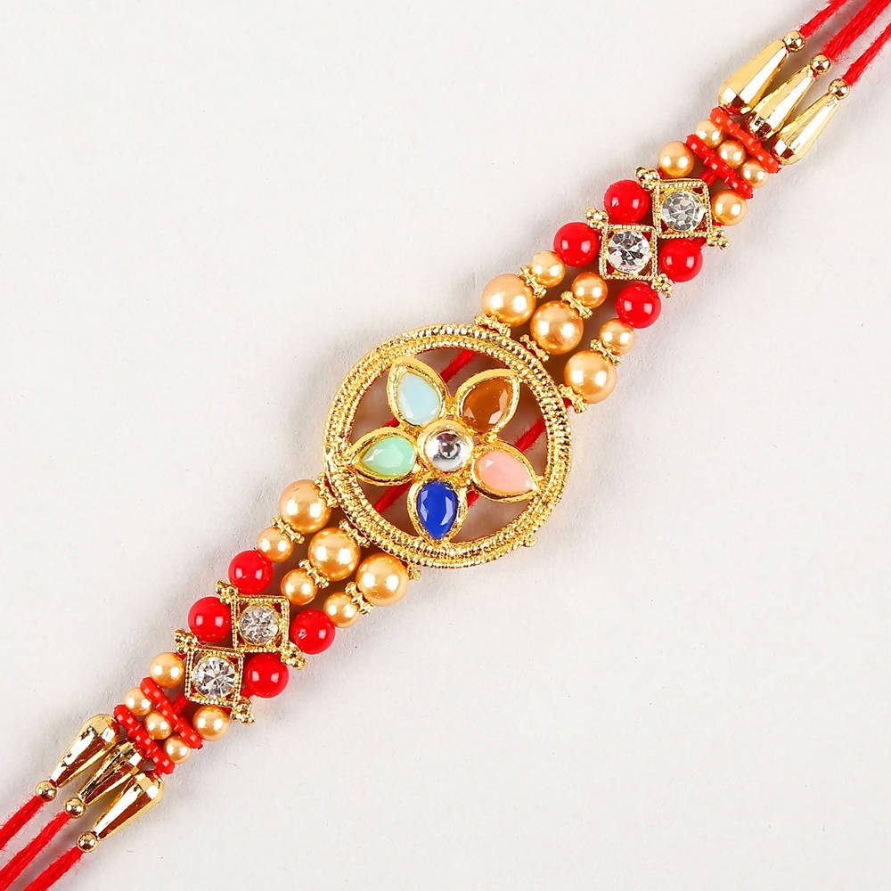 Flower Design Kundan Rakhi and Kaju Rolls Box - Distacart