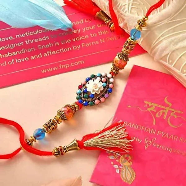 Floral Blue Rakhi N Coffee Biscotti Hamper - Distacart