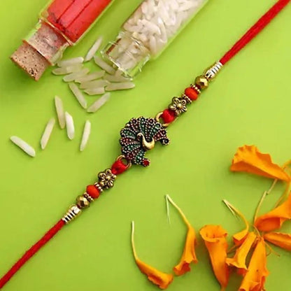 Beautiful Peacock Ethnic Rakhi & Cadbury Temptations - Distacart