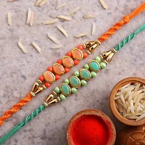 Set of 2 Fancy Pastel Rakhi and Fruit N Nut Chocolates - Distacart