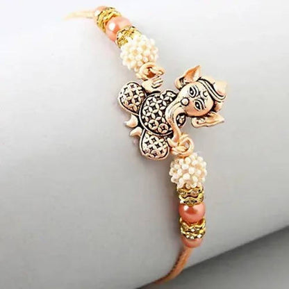 Holy Ganesha Rakhi & Ferrero Rocher Moments Pack - Distacart