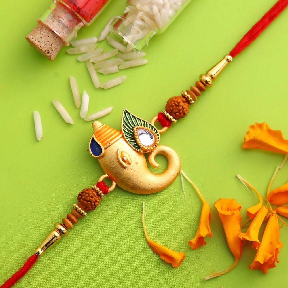Spiritual Lord Ganesha Rakhi & Kaju Roll Box