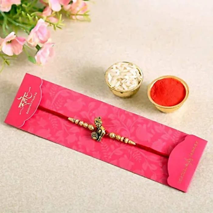 Divine Lord Krishna Pearl Rakhi & Cashew Jar - Distacart