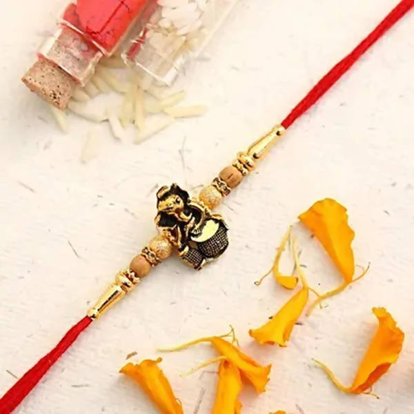 Devotional Lord Ganesha Rakhi & Kaju Roll Box - Distacart