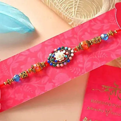 Floral Blue Rakhi N Coffee Biscotti Hamper - Distacart