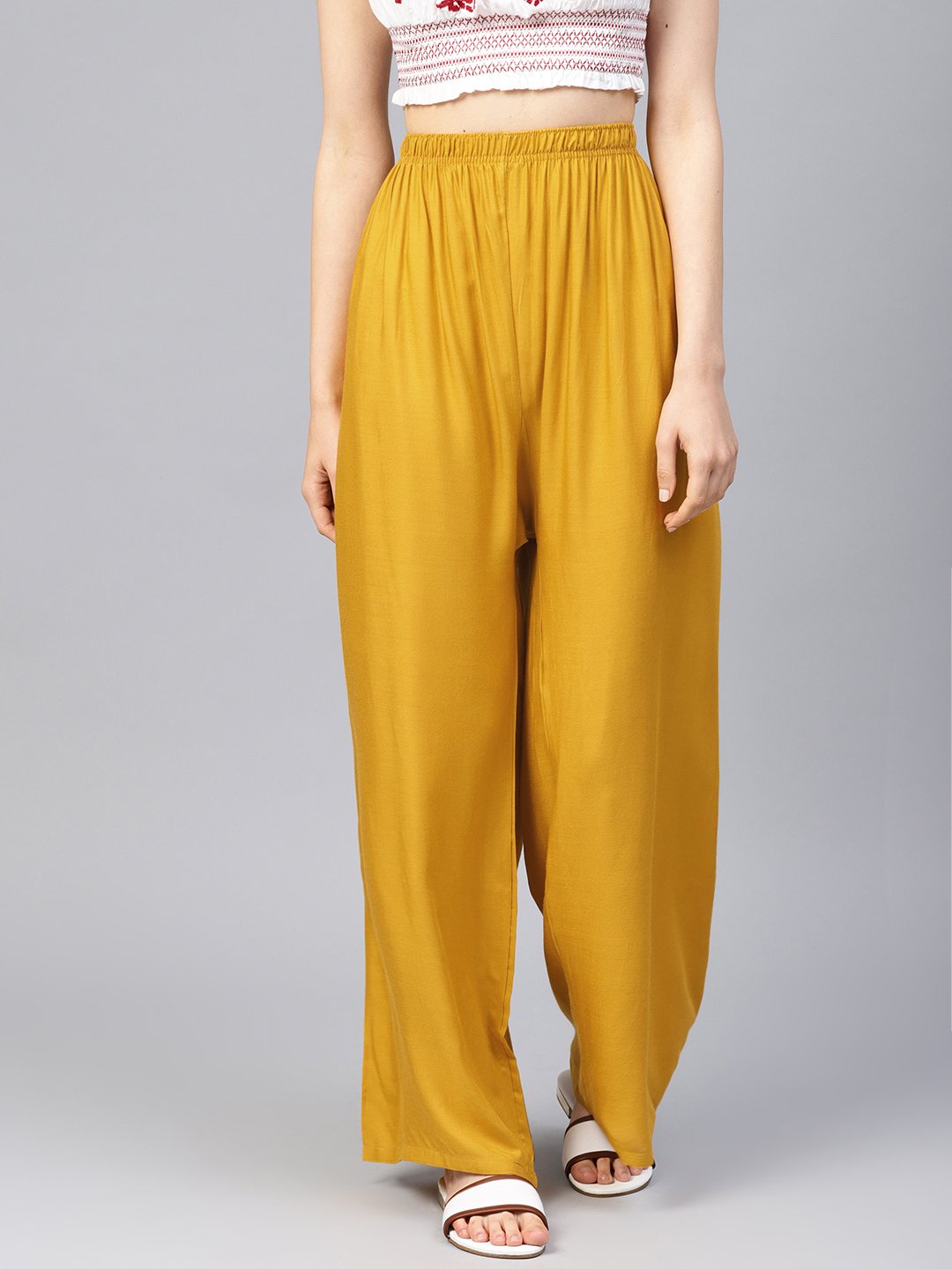 Jompers Women Mustard Solid Straight Palazzos - Distacart