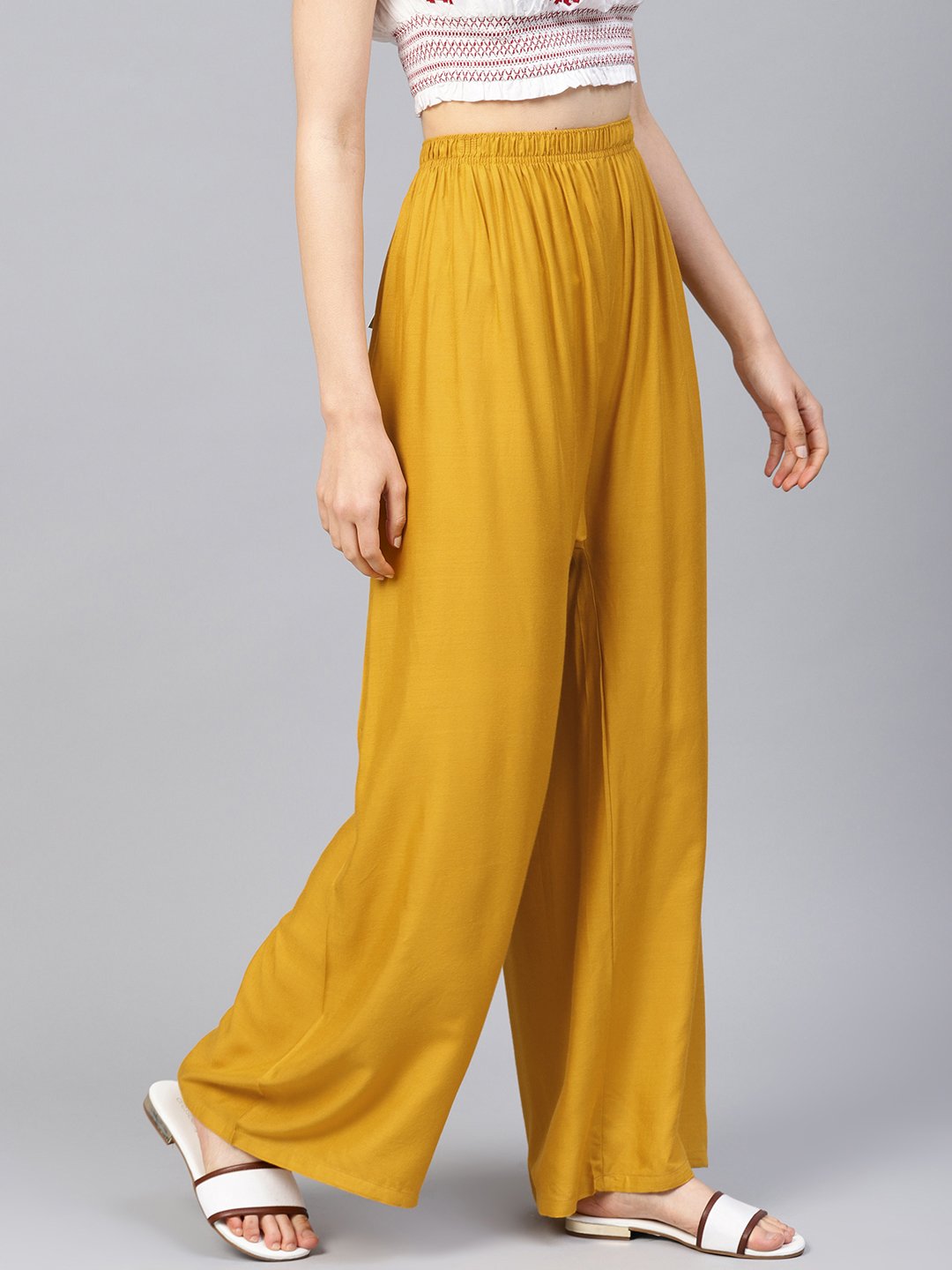 Jompers Women Mustard Solid Straight Palazzos - Distacart