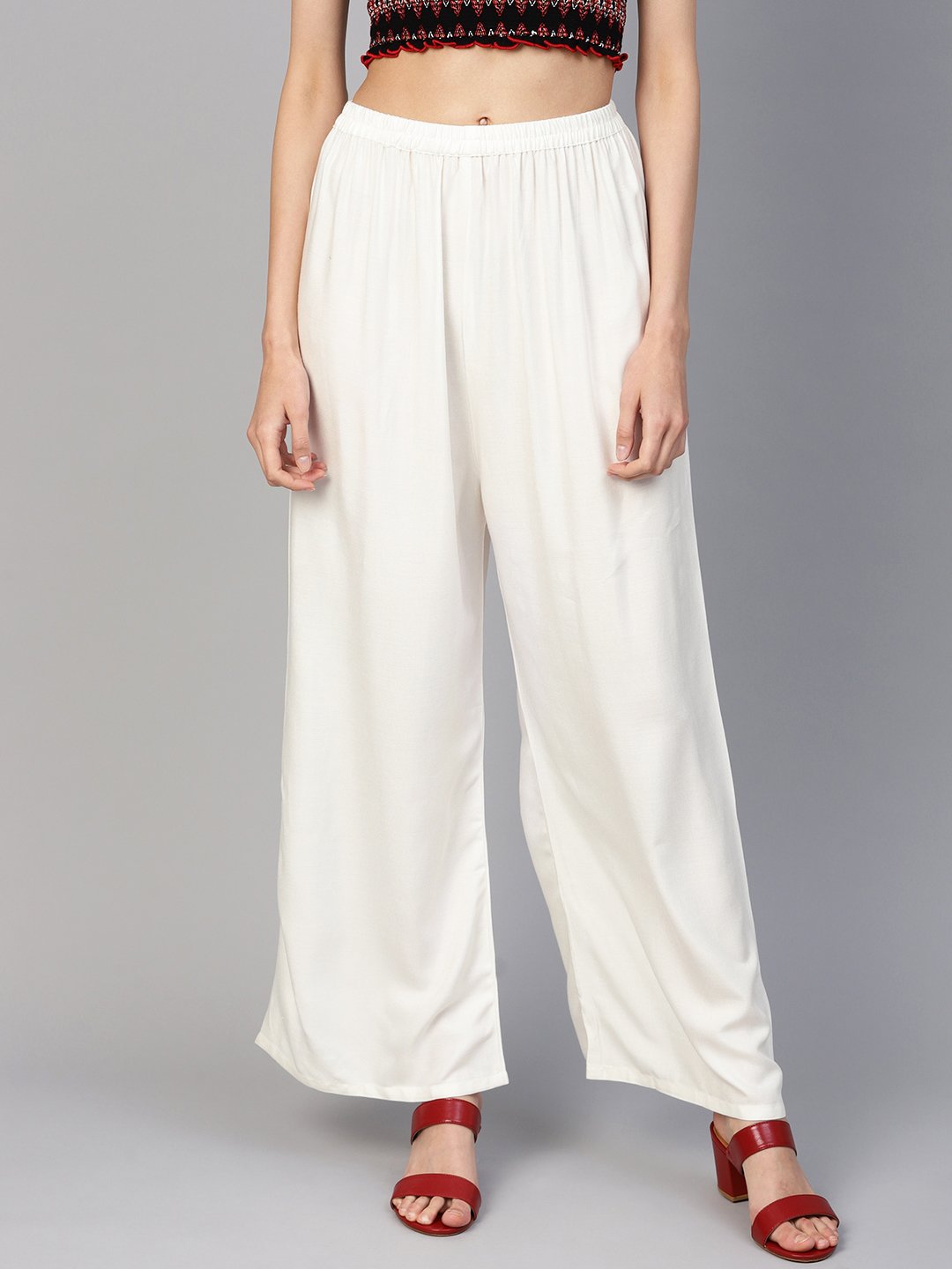 Jompers Women Off-White Solid Straight Palazzos - Distacart