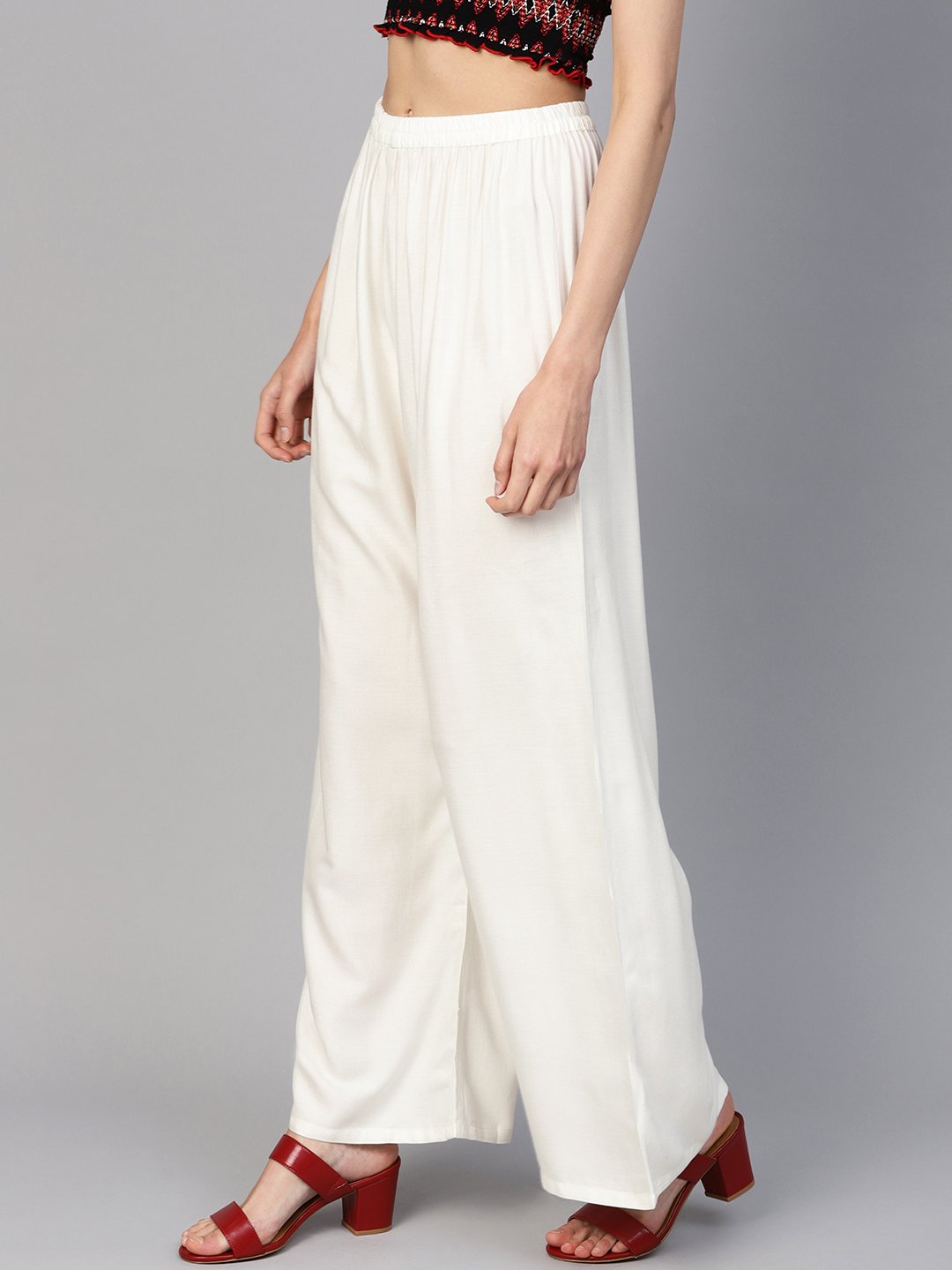Jompers Women Off-White Solid Straight Palazzos - Distacart