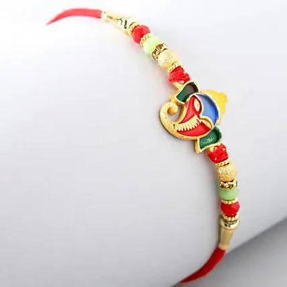 Divine Lord Ganesha Rakhi & Soan Papdi - Distacart