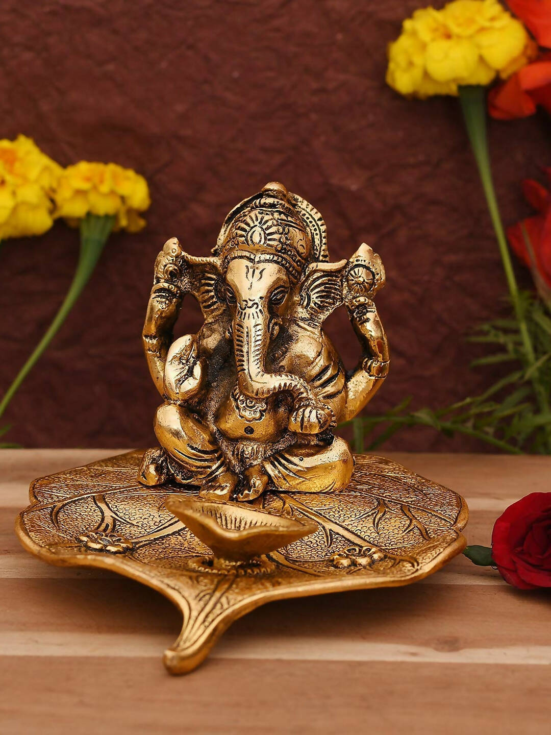 CraftVatika Gold Toned Aluminium Ganesh with Diya Idol - Distacart