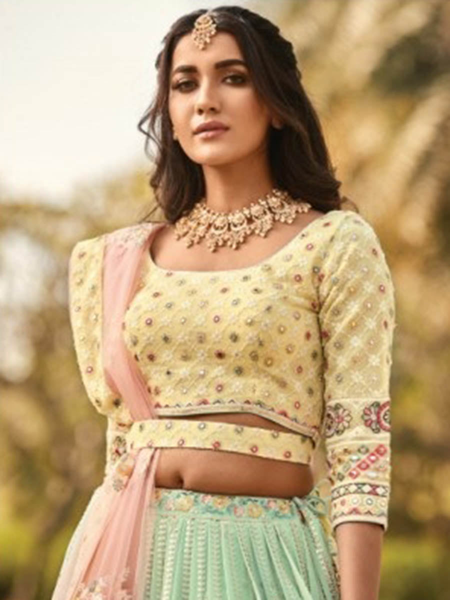 Myra Sea Blue and Lemon Yellow Heavy Embroidered Party Wear Lehenga