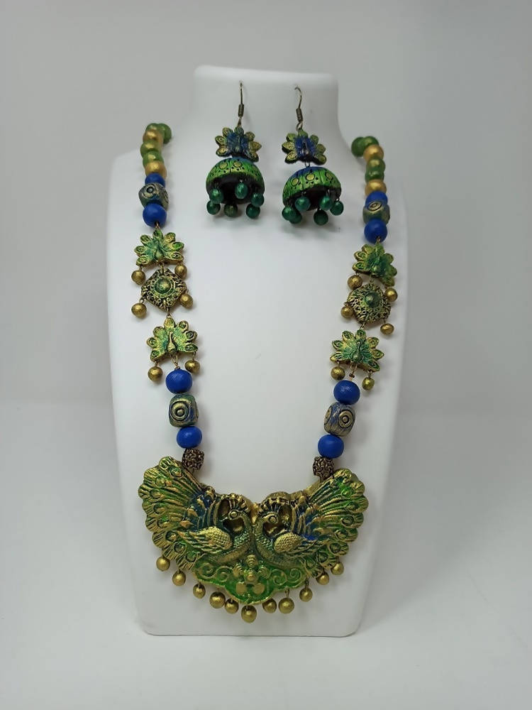 Terracotta Long Haram Set-Beautiful Dazzling Peacock Pendent With Ear Hanging Jhumkas