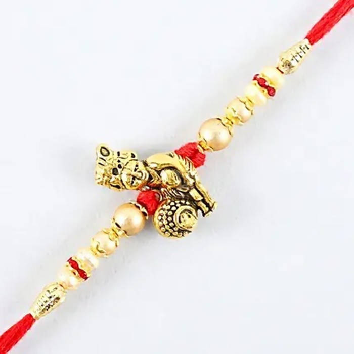 Divine Lord Krishna Pearl Rakhi & Cashew Jar - Distacart