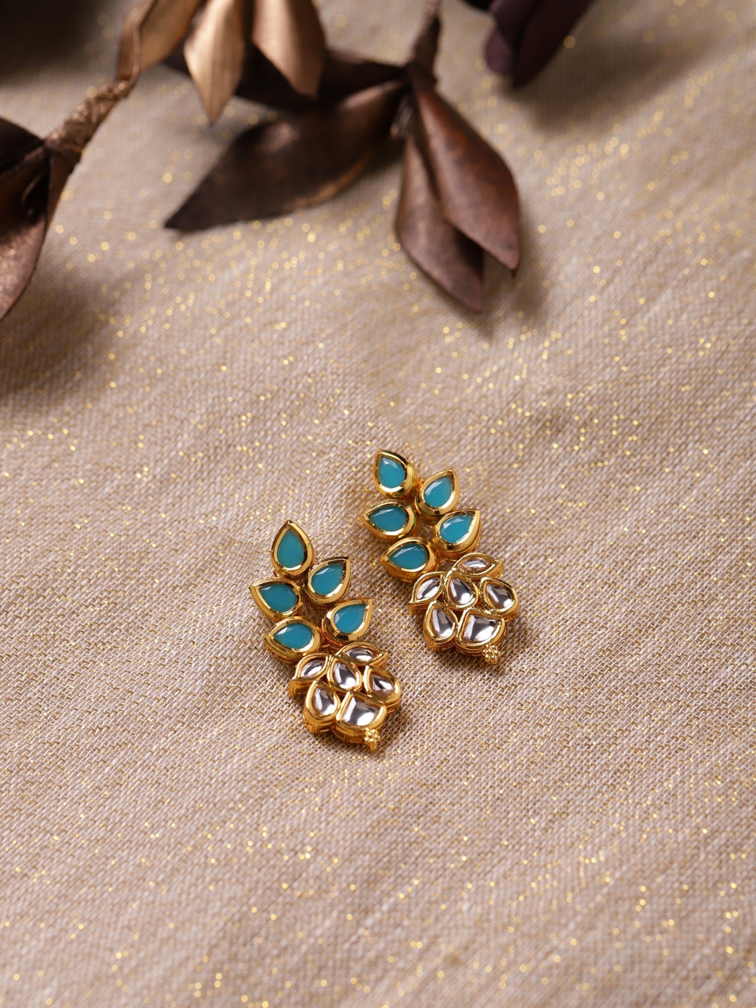 Gold-Toned Leaf Shaped Studs Earrings - Ruby Raang - Distacart