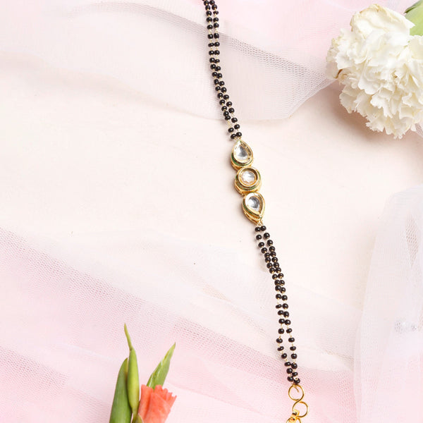Black Gold-Toned Kundan Bracelet Mangalsutra - Ruby Raang - Distacart