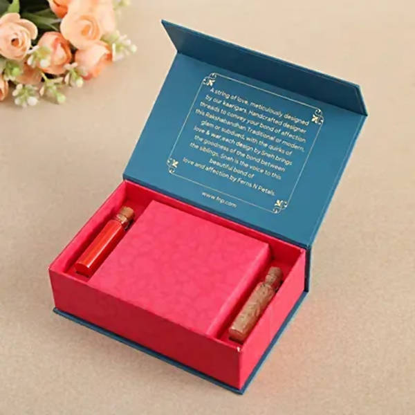 Om Pearl Bracelet Rakhi & Cashew Jar - Distacart