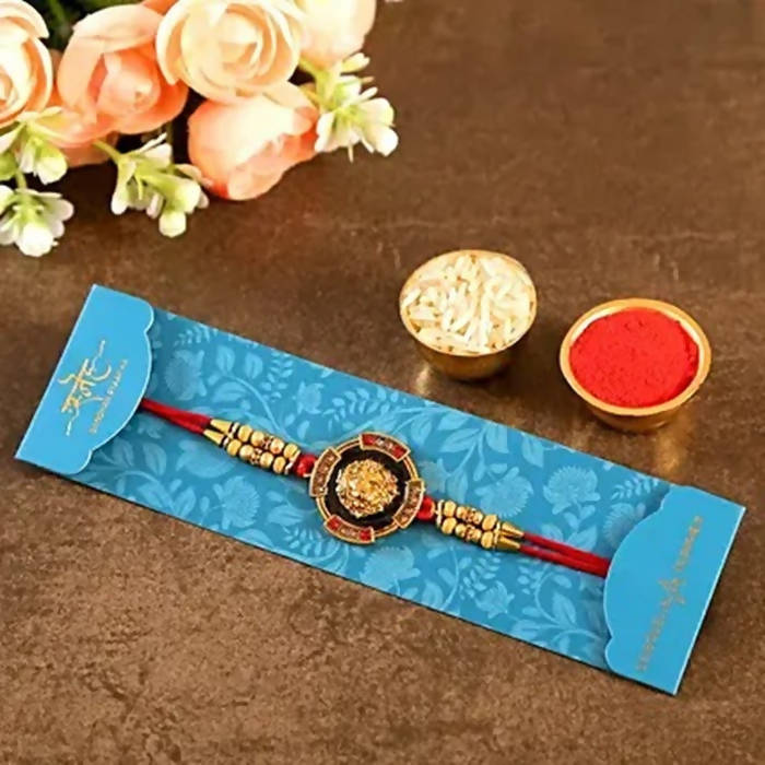 Traditional Lion Face Rakhi & 2 Dairy Milk Silk - Distacart
