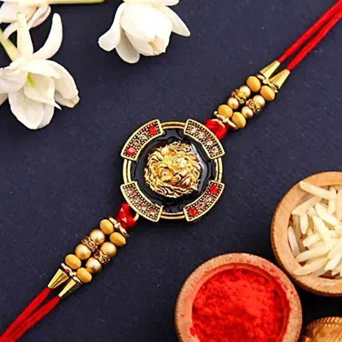 Traditional Lion Face Rakhi & Kaju Roll Box - Distacart