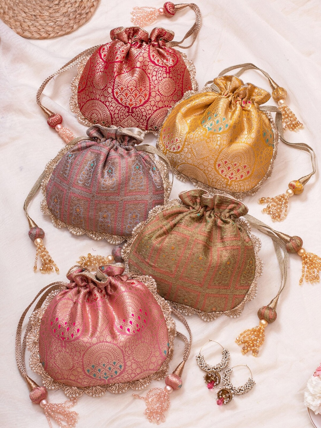 Buy Gold Floral Embroidered Potli Bag Bags Online in India - The AMYRA Store