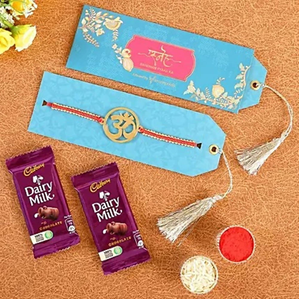 Ethnic Om Metal Rakhi & Dairy Milk Chocolates - Distacart