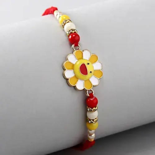Ferns N Petals Sunflower Kids Rakhi & Almonds Jar - Distacart