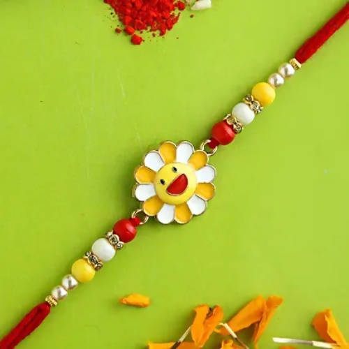 Ferns N Petals Sunflower Kids Rakhi & Almonds Jar - Distacart