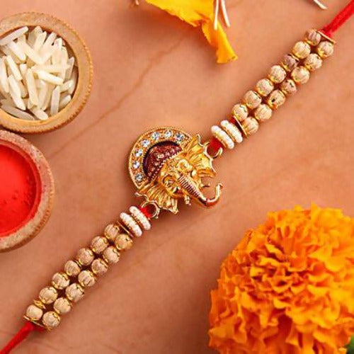 Beautiful Ganesha Rakhi and Chocolates