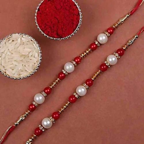 Set of 2 Pearl Rakhis With Cadbury Celebrations Online