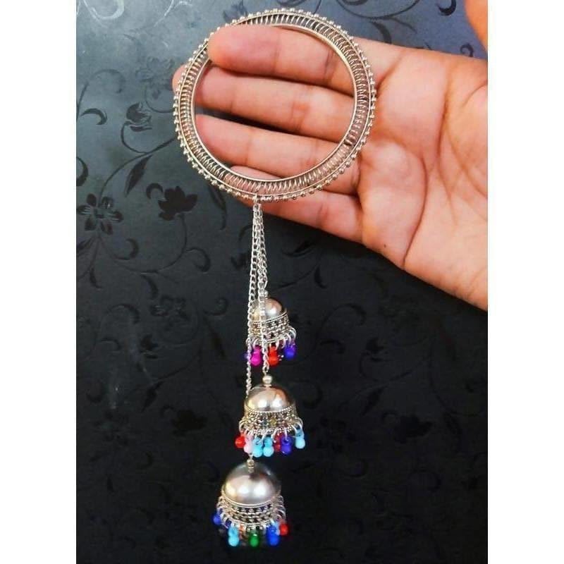 Hanging Jhumkas With Silver Color Bangle