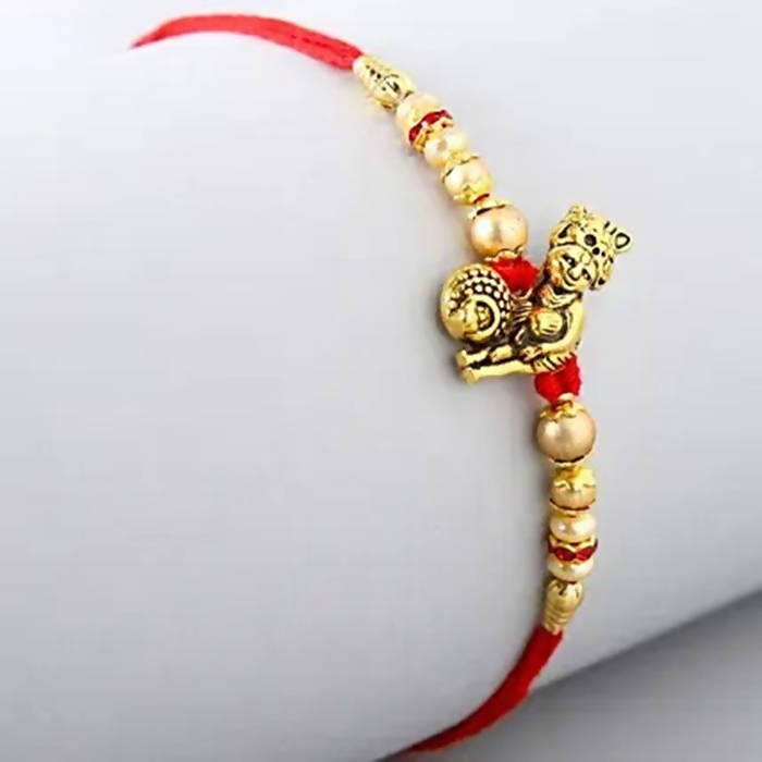 Divine Lord Krishna Pearl Rakhi & Cashew Jar - Distacart