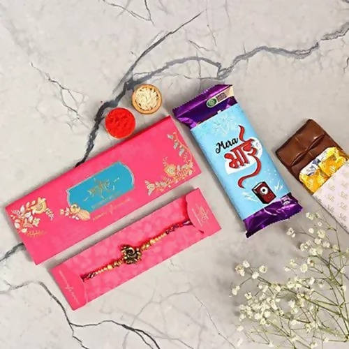 Ganesha Rakhi & Cadbury Silk In Mera Bhai Sleeve