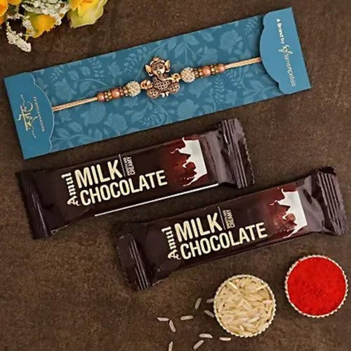 Enticing Ganesha Rakhi & Amul Milk Chocolate Flow Wraps