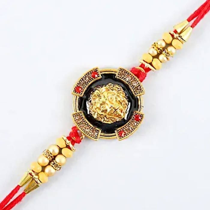 Traditional Lion Face Rakhi & 2 Dairy Milk Silk - Distacart
