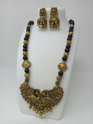 Terracotta Long Necklace Set With Peacock Pendant With Temple Jhumkas-Black And Gold