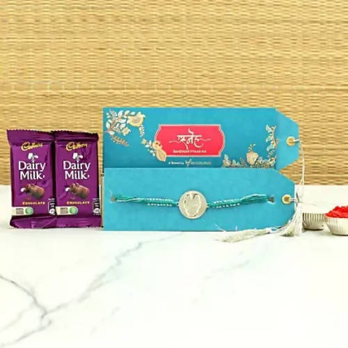 Ironman Metal Rakhi & Dairy Milk Chocolates - Distacart