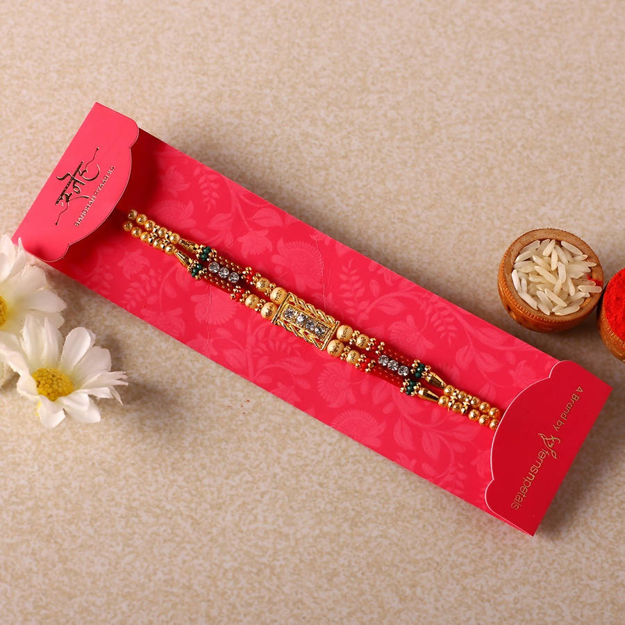 Dainty Kundan Rakhi And Kaju Rolls Box - Distacart