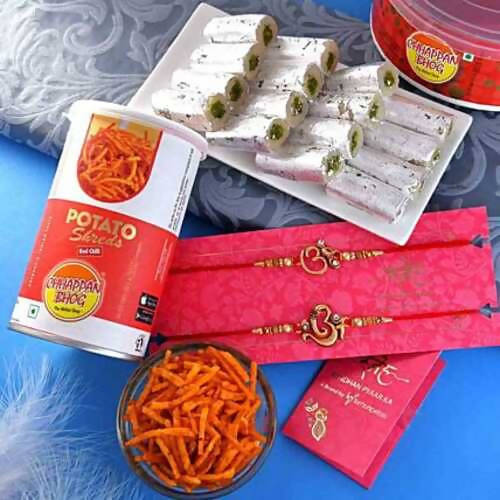 2 Divine Om Rakhis & Pista Kaju Roll Box Hamper Combo