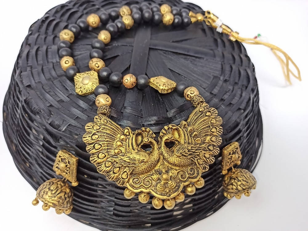 Terracotta Long Necklace Set With Peacock Pendant With Temple Jhumkas-Black And Gold