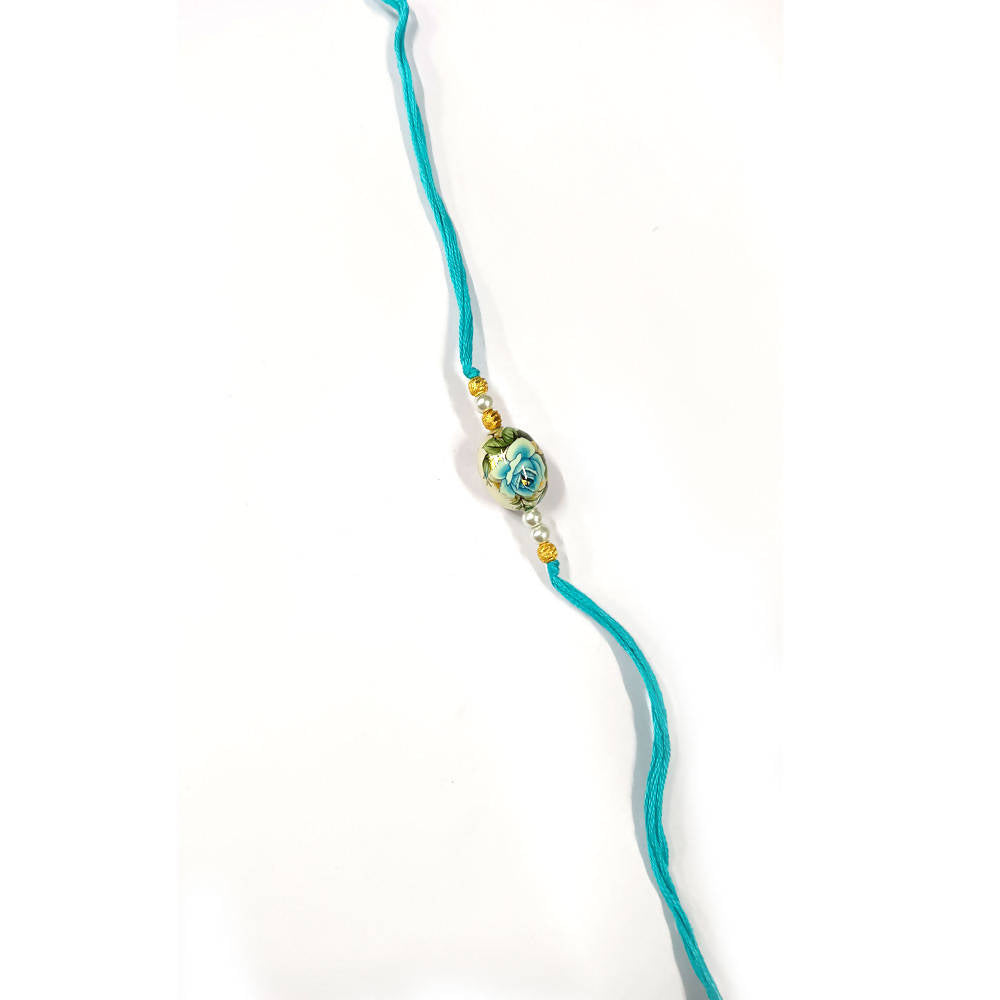 Blue Floral Rakhi - Distacart