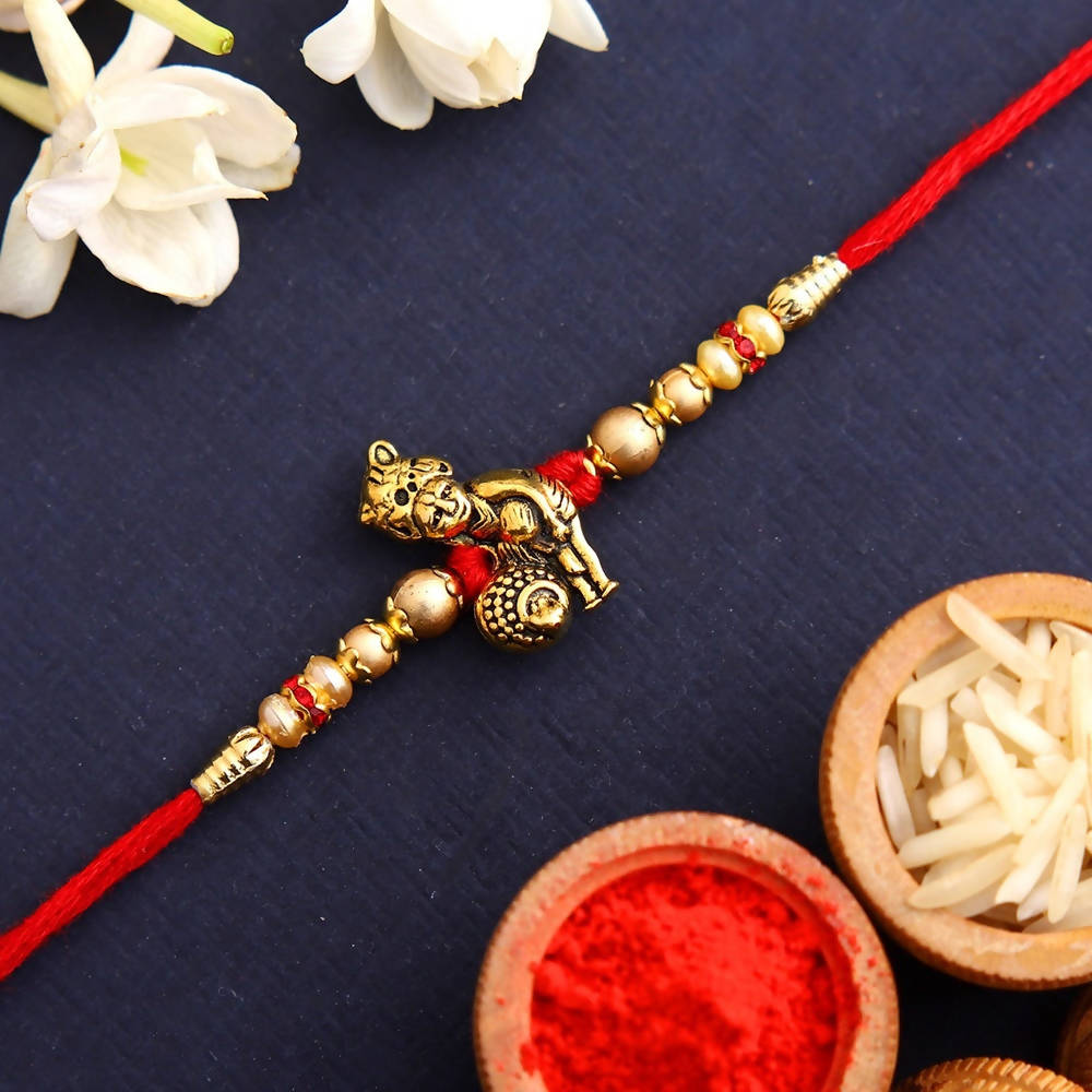 Divine Lord Krishna Pearl Rakhi & Cashew Jar - Distacart